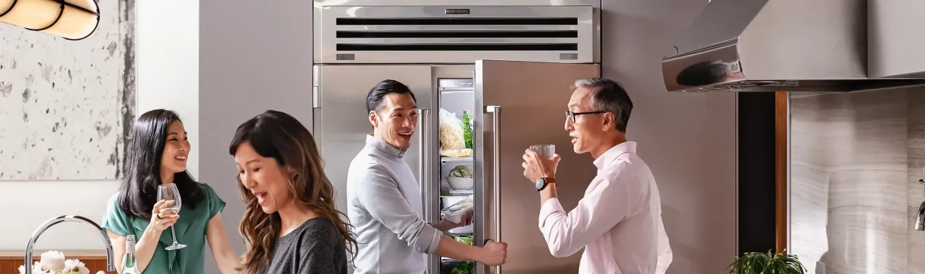 family opening refrigerator